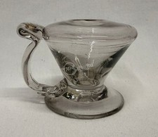 Antica lampada ad olio d'epoca